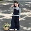 Conjunto de Roupa de Primavera para Meninas 2026 Novo Estilo Coreano Falso Duas Peças Camiseta de Manga Longa Calça de Perna Larga Conjunto de Duas Peças Crianças Médias e Grandes Casual