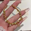 Livro Vermelho Explosões de Íris Pulseira Alto Senso Feminina Retrô Francês Leve Luxo Flor Microincrustada Pulseira