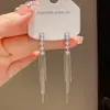 Pendientes largos de borla de circón de moda exquisita coreanos y japoneses, únicos, de lujo ligero, versátiles, de alta gama, súper brillantes, pendientes adelgazantes para mujer