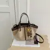 Bolso cubo de gran capacidad transfronterizo para mujer, nuevo bolso de hombro versátil de moda otoño 2026, bolso tote para el trabajo, bolso de axila