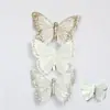 Paquete de 3 decoraciones de mariposas de plumas, con clips de mariposa realistas y tridimensionales, con brillo dorado reluciente, perfectas para decoraciones de Navidad