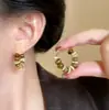 ¡Hace que la cara se vea más pequeña! Pendientes de Borlas Florales con Estampado de Leopardo para Mujer, Pendientes Exagerados con Estilo, Diseño de Nicho, Pendientes de Alta Gama