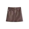 [Con shorts de seguridad incorporados + cintura elástica en la espalda] Falda corta de cuero PU de cintura alta, moderna y elegante, versátil y estilizada para mujer