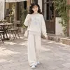 Conjunto de suéter con lazo bordado estilo coreano para niñas, nueva colección de otoño 2026, holgado y cómodo, top suave y cálido, moderno