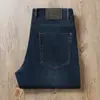Calças Jeans Retas Elásticas Finas de Primavera e Verão Europeias azul escuro Casuais High-end Anti-rugas Soltas para Trabalho para Homens