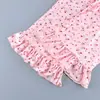 Pijama cruzado de otoño e invierno nuevo europeo y americano, conjunto de top de punto calado estampado con tirantes y pantalones largos con volantes, ropa para el hogar