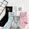 Calcetines transfronterizos, calcetines de tubo femeninos, primavera y otoño, color caramelo, ojos grandes, lindos calcetines de dibujos animados de estudiantes, explosiones de comercio exterior