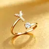 El producto transfronterizo más vendido de TEMU: Anillo de moda para mujer con 26 letras inglesas microincrustadas de circonita, anillo abierto liso de cobre chapado en 14K