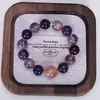 Pulsera Fuego Morado de Nueve 2025 Femenina Amatista Benmingnian Cristal de Pelo Morado Transferencia Oro Negro Super Siete Pulsera Mayoreo