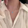 Collar de Trébol de Cuatro Hojas Azul Paraíba para Mujer Modelo Nuevo 2026 Accesorio de Collar de Clavícula de Lujo Ligero de Gama Alta de Nicho
