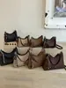 Bolsa de brim de grande capacidade para mulheres, nova bolsa versátil de ombro e transversal para o verão de 2026, bolsa tote para ombro de trajeto transfronteiriço