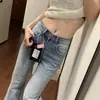 Jeans acampanados lavados azul claro estilo americano para mujer, nueva colección otoño 2026, de cintura alta, no ajustados y con una silueta fluida