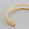 Pulsera de anillo de Mobius para mujer, ola simple, pulsera versátil, celebridad de Internet, Mori, abierta, color electrochapado, protección de color, oro de 18 quilates