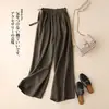 Pantalones Casuales de Algodón y Lino de Cintura Alta con Lazos Laterales Estilo Retro Artístico Elásticos de Nueve Puntos Pierna Ancha para Mujer Venta al por Mayor