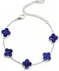 Pulsera de acero de titanio chapada en oro de 18k, de cuatro hojas, lisa, de moda, de venta caliente, con nácar de doble cara, fábrica de joyería de alta gama para mujer