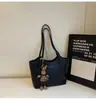 Bolsa Transfronteriza Simple Casual de Gran Capacidad para Mujer Nueva Moda Nicho Bolso Tote para el Trabajo Versátil Bolso de Hombro Único para el Brazo