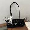 Bolso de axila 2026 Primavera Nuevo estilo Simple Estilo coreano Diseño de nicho Lindo Bolso de trabajo Bolso de hombro simple de moda