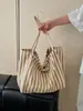 Bolso de lona a rayas verticales simple artístico estilo coreano, gran capacidad, bolso de hombro casual y versátil para mujer, transfronterizo