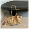 Bolso tote de acabado mate transfronterizo, bolso de hombro de gran capacidad para mujer, bolso de mano de alta gama, nicho, estilo vintage, y bolso de axila