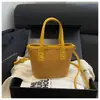 Comercio exterior al por mayor moda estilo coreano 2026 otoño nuevo tejido gran capacidad para mujer moda de viaje bolso de hombro bandolera