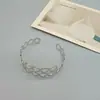 Pulsera Metálica Hueca de Apertura Amplia de Comercio Exterior Europeo y Americano Diseño Geométrico de Nicho Pulsera Punk Joyería Punk Geométrico