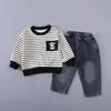 Conjunto de Ropa de Otoño para Niños 2026 Nuevo Estilo Versión Coreana Elegante Bebé Primavera/Otoño Rayas Dibujos Animados Manga Larga Conjunto de Dos Piezas Moderno
