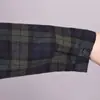 Colección de otoño 2026: nuevo vestido midi a cuadros de estilo coreano, corte holgado, con cuello, bolsillos y mangas largas, diseñado como un vestido camisero para mujer