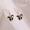 Pendientes de lujo con diseño de nicho coreano, con lazo negro y aguja de plata S925, nuevos y elegantes pendientes retro de moda para mujer.