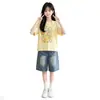 Conjunto de Camiseta de Verano para Niñas 2026 Nuevo Estilo Coreano Moda Camiseta de Manga Corta para Niña Pequeña y Shorts de Mezclilla Conjunto de Dos Piezas Tendencia