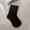Calcetines de Mujer Zhiji Otoño e Invierno Nuevos Estampado de Leopardo Color Café de Moda de Media Pantorrilla Color Maillard Moda Coreana Versátiles