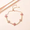 Pulsera de Cuatro Hojas de Zirconia Flor de Cuatro Pétalos de la Suerte Más Vendida de Alta Calidad de Douyin, Pulsera Ajustable Femenina y de Alta Gama