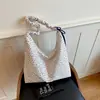 Bolsa casual floral de nailon estilo coreano para mujer, nueva y versátil bolsa de hombro y cruzada para el día a día 2026, bolsa de mano de gran capacidad