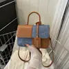 Bolso de mano pequeño a bloques de color al por mayor transfronterizo 2026 modelo nuevo bolso cruzado texturizado bolso de hombro de moda
