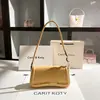 Una generación de bolso baguette de alta gama 2025 primavera nuevo lujo nicho bolso de axila bolso de hombro al por mayor