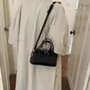 Elegante bolso Boston tejido para mujer, nuevo bolso cruzado tipo almohada de verano vintage 2026 para el trabajo