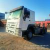 Fabricantes Exportan Cabezal de Tractor de Segunda Mano Howo Tractor de Doble Tracción 375 Caballos de Fuerza Cabezal de Camión de Transporte