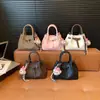 Bolso de Mano para el Trabajo Mujer 2026 Nuevo Retro Simple Bolso Cubo Estilo Coreano Casual Moda Bolso Cruzado