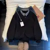 Camisa de polo tipo patchwork a cuadros de dos piezas falsas para hombre, primavera y otoño, de alta gama, elegante, camiseta casual de manga larga, sudadera de hombro regular