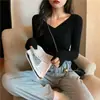 Nuevo Top de Punto Básico de Manga Larga con Cuello en V Otoño/Invierno 2026 Suéter Elegante Superventas de Corte Ajustado con Escote Bajo para Mujer Ropa Interior