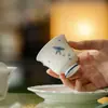 Estilo Dinastía Tang y Song Arcilla de Jade Pintada a Mano Azul y Blanco Mariposa Patrón Floral Pequeño Cerámica Doméstica Taza Maestra de Pie Alto Juego de Té Kung Fu Taza de Té