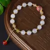 Pulseira de Contas Redondas de Jade Dourado Sete Cores de Xinjiang para Homens e Mulheres, Pulseira de Jade Articulada de Bambu Pêssego, Mais Vendido da Transmissão ao Vivo