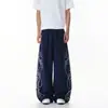 Calça casual reta de moletom estilo esportivo retrô americano para homens, corte solto com design de estampa de letras, adequada para primavera e outono