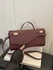 Nova bolsa clutch longa da Amazon 2025 com padrão de palmeira, versão mini da bolsa de mão de moda Kelly, bolsa transversal para mulheres