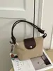 Bolso vintage de venta caliente transfronterizo para mujer, nuevo bolso de hombro versátil de moda 2026, bolso de axila, bolso tipo empanada para ir al trabajo