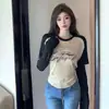 [Foto real] design plus size top chic vazado feminino outono e inverno redução de idade emagrecimento letras bordadas manga longa t