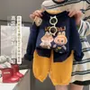 Niños y Niñas 2025 Primavera y Otoño Nuevo Traje Casual de Dibujos Animados Celebridad de Internet Lindo Estampado Manga Larga Holgado Personalizado Conjunto de Dos Piezas