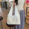 Nova Bolsa de Lona Bordada Floral Vazada para Primavera e Verão Feminina Fashionável Versátil Bolsa de Ombro Grande Capacidade Bolsa Tote para o Dia a Dia