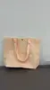 Bolsa de mano de alta gama para tienda de ropa de mujer, bolsa de regalo de embalaje tejida, bolsa de embalaje para compras, se puede imprimir con logo