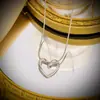 Collar Casual y Versátil de Acero de Titanio con Corazón para Mujer Pendientes de Moda de Celebridad de Internet Set de Pendientes de Cadena para Clavícula de Mujer Decoración
