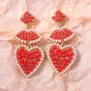 Moda Europea y Americana Romántico Día de San Valentín Nicho Diseño Creativo Aleación Diamante Perlas de Arroz Colgante de Amor Pendientes para Mujer